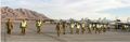 No 77 Squadron Association Deployments photo gallery - 77 Squadron ground crew perform a FOD check of the tarmac which was shared with multi-national partners (77 Squadron)